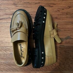Free people tan lug sole loafers with tassels